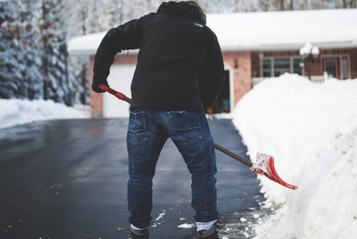 person shoveling snow