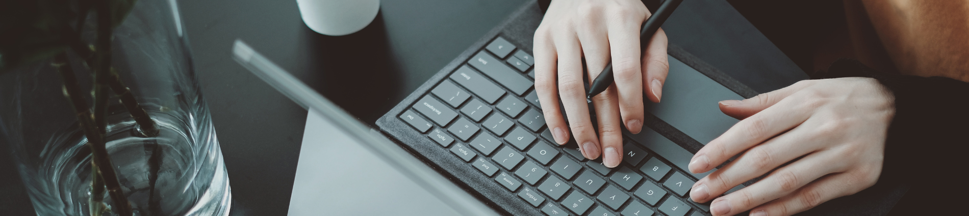 Hands on a laptop