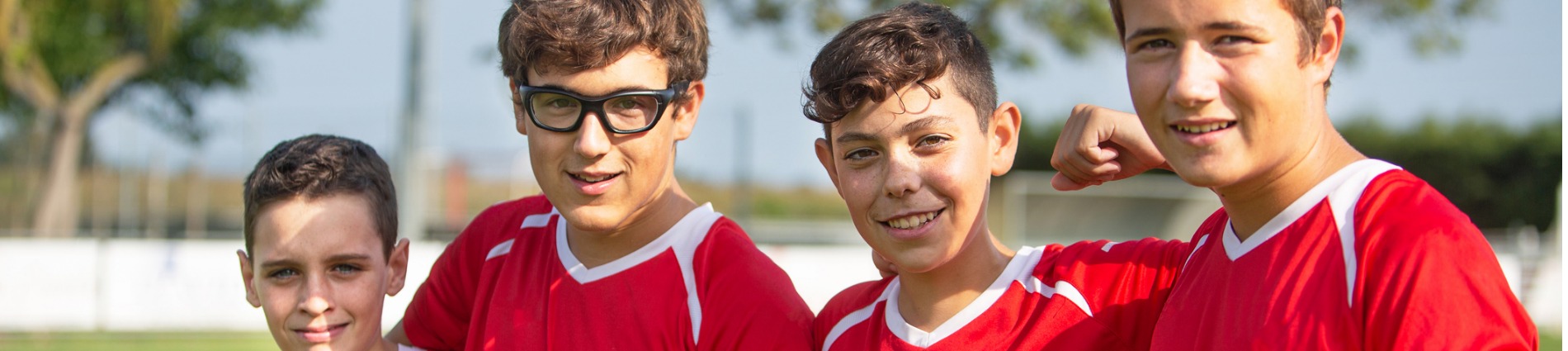 teenage boys playing soccer