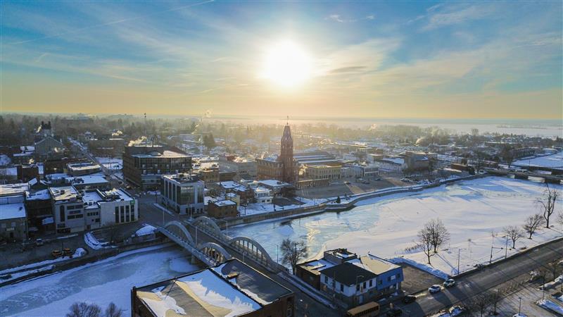City Hall along frozen Moira River at dawn