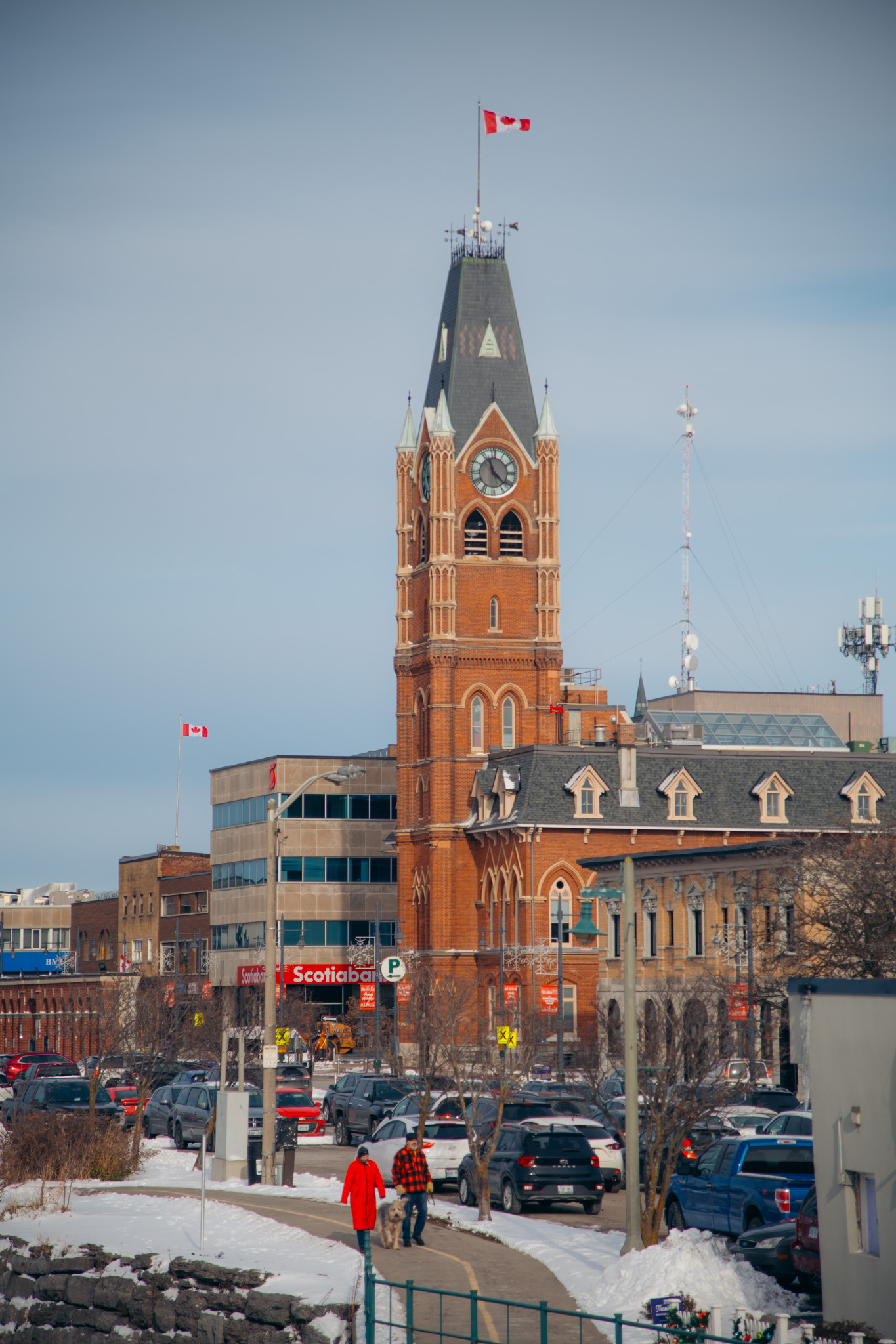 Couple walking along trail in front of City Hall