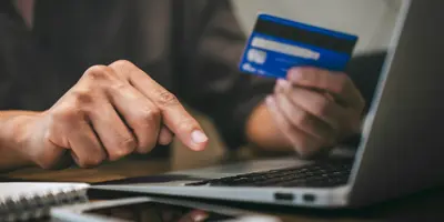 Person purchasing something online with credit card