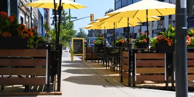 Patio with yellow umbrellas in downtown Belleville.