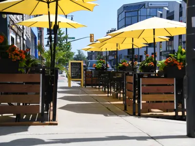 Patio with yellow umbrellas in downtown Belleville.