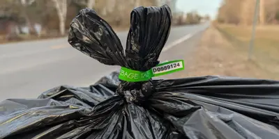 Garbage bag with bag tag