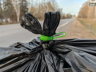 Garbage bag with bag tag