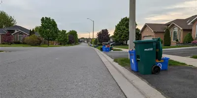 Waste bins along road in subdivision