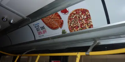 Example of Interior Ad above seats inside bus