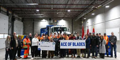 Staff and OLG reps at cheque presentation