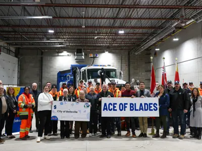 Staff and OLG reps at cheque presentation